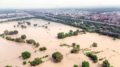 An aerial view of Mayur Vihar shows the swollen Yamuna overflowing after heavy rain pounded the national capital. (ANI Video Grab) An aerial view of Mayur Vihar shows the swollen Yamuna overflowing after heavy rain pounded the national capital. (ANI Video Grab)