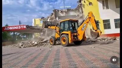 An illegal structure being razed on Shri Ramswaroop Memorial University campus on Lucknow-Deva Road on Sept 6. (Sourced) An illegal structure being razed on Shri Ramswaroop Memorial University campus on Lucknow-Deva Road on Sept 6. (Sourced)