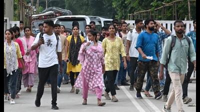 Candidates coming out of an exam centre after appearing in UPSSSC PET 2025 in Lucknow on September 6. (Mushtaq/HT) Candidates coming out of an exam centre after appearing in UPSSSC PET 2025 in Lucknow on September 6. (Mushtaq/HT)