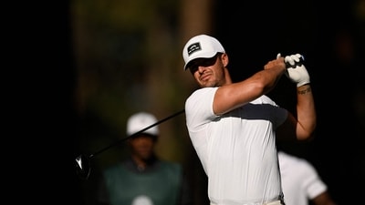 Derek Carr plays his shot from the second tee box during the first round of the American Century Championship at Edgewood Tahoe (Getty Images via AFP) Derek Carr plays his shot from the second tee box during the first round of the American Century Championship at Edgewood Tahoe (Getty Images via AFP)