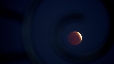 A rare 'blood Moon' total lunar eclipse is captured near totality from the village of Donon, 40 km from Pontevedra, in northwestern Spain, early on March 14, 2025. (AFP File) A rare 'blood Moon' total lunar eclipse is captured near totality from the village of Donon, 40 km from Pontevedra, in northwestern Spain, early on March 14, 2025. (AFP File)