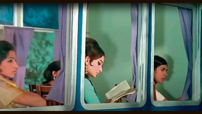Happy daze: Sharmila Tagore reads, while others look out at the passing countryside, during the train ride through the hills in Aradhana (1969). Happy daze: Sharmila Tagore reads, while others look out at the passing countryside, during the train ride through the hills in Aradhana (1969).