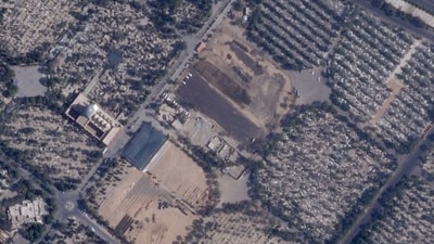 This satellite photo provided by Planet Labs PBC shows Iran paving over Lot 41, where some of those executed in the chaos after Iran's 1979 Islamic Revolution were buried, at Behesht-e Zahra cemetery outside of Tehran, Iran. (AP) This satellite photo provided by Planet Labs PBC shows Iran paving over Lot 41, where some of those executed in the chaos after Iran's 1979 Islamic Revolution were buried, at Behesht-e Zahra cemetery outside of Tehran, Iran. (AP)