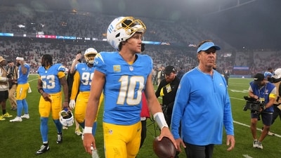 Los Angeles Chargers quarterback Justin Herbert leaves the field after beating the Chiefs on Friday (AP) Los Angeles Chargers quarterback Justin Herbert leaves the field after beating the Chiefs on Friday (AP)