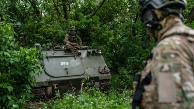 Ukrainian soldiers and an armored vehicle in the Sumy region. Ukrainian soldiers and an armored vehicle in the Sumy region.