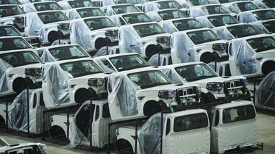 File photo: Vehicle cabins at Mahindra & Mahindra at an assembly plant (Bloomberg/File) File photo: Vehicle cabins at Mahindra & Mahindra at an assembly plant (Bloomberg/File)