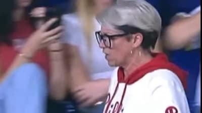 The woman, dubbed Phillies Karen, could be heard saying in a video that the ball was in her hand. (X/@FFT1776) The woman, dubbed Phillies Karen, could be heard saying in a video that the ball was in her hand. (X/@FFT1776)