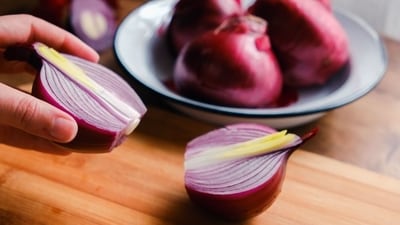 Considering using onion juice for your own hair care? Read on to know how it can help reduce your hair fall. (Shutterstock) Considering using onion juice for your own hair care? Read on to know how it can help reduce your hair fall. (Shutterstock)