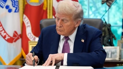 President Donald Trump signs an executive order in the Oval Office of the White House, Friday, Sept. 5, 2025, in Washington. AP/PTI(AP09_06_2025_000005B) (AP) President Donald Trump signs an executive order in the Oval Office of the White House, Friday, Sept. 5, 2025, in Washington. AP/PTI(AP09_06_2025_000005B) (AP)