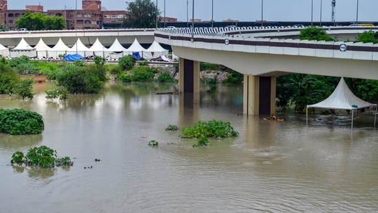 Pillars of a flyover is seen to be submerged as waters of the Yamuna flooded parts of Mayur Vihar Khader on Friday.(RAJ K RAJ /HT PHOTO)