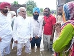 Congress Punjab in-charge Bhupesh Baghel, Punjab Pradesh Congress Committee (PPCC) president Amarinder Singh Raja Warring meet residents at flood-hit Fattewala village in Tarn Taran on Saturday. (HT) Congress Punjab in-charge Bhupesh Baghel, Punjab Pradesh Congress Committee (PPCC) president Amarinder Singh Raja Warring meet residents at flood-hit Fattewala village in Tarn Taran on Saturday. (HT)