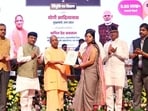 UP chief minister distributing appointment letter to a newly recruited instructor at an event in Lucknow on Sept 7. (Sourced) UP chief minister distributing appointment letter to a newly recruited instructor at an event in Lucknow on Sept 7. (Sourced)
