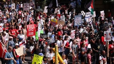 Thousands of people were seen on the streets on Saturday during the ‘We are all DC’ march with banners, posters and slogans.&nbsp; (Bloomberg)