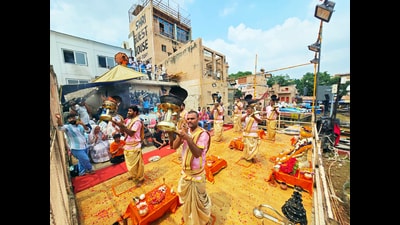 Famous Maa Ganga Aarti held at Dashashwamedh Ghat during the day due to lunar eclipse, in Varanasi on Sunday. (ANI)