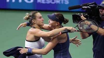 Sabalenka and Anisimova embrace at the net after the Belarusian player sealed the match point and her title. (Getty Images via AFP) Sabalenka and Anisimova embrace at the net after the Belarusian player sealed the match point and her title. (Getty Images via AFP)
