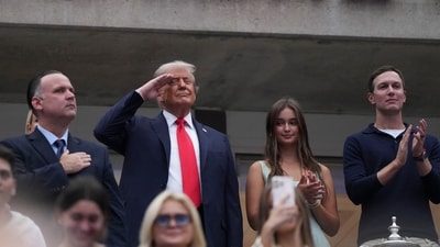 President Donald Trump stands for the National Anthem with Dan Scavino, Arabella Kushner, and Jared Kushner prior to the final of mens singles at Billie Jean King National Tennis Center. Mandatory Credit: Robert Deutsch-Imagn Images (Reuters)