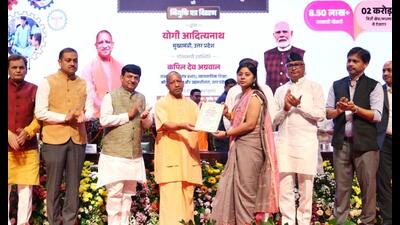 UP chief minister distributing appointment letter to a newly recruited instructor at an event in Lucknow on Sept 7. (Sourced) UP chief minister distributing appointment letter to a newly recruited instructor at an event in Lucknow on Sept 7. (Sourced)