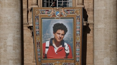Carlo Acutis, who died aged 15, learned computer code to build websites to spread his faith. (REUTERS)