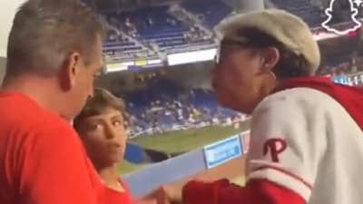 A fan confronts a Phillies supporter over a home run ball during the Philadelphia Phillies vs Miami Marlins game, sparking the viral ‘Phillies Karen’ controversy. (X/@Phillies) A fan confronts a Phillies supporter over a home run ball during the Philadelphia Phillies vs Miami Marlins game, sparking the viral ‘Phillies Karen’ controversy. (X/@Phillies)