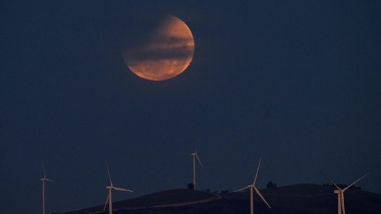 A reddish tint is also visible during the lunar eclipse, which is why the event is also called the ‘Blood Moon’. (AFP)