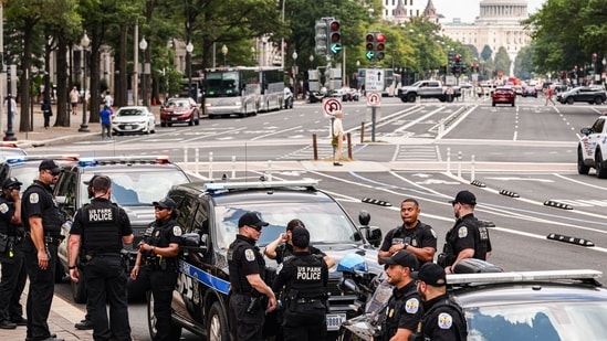 US Park Police (USPP) officers stand guard near the protest site in Washington DC,&nbsp;(Bloomberg)