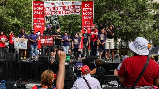 Protesters at the "We Are All D.C." march included undocumented immigrants and supporters of Palestine(Bloomberg)