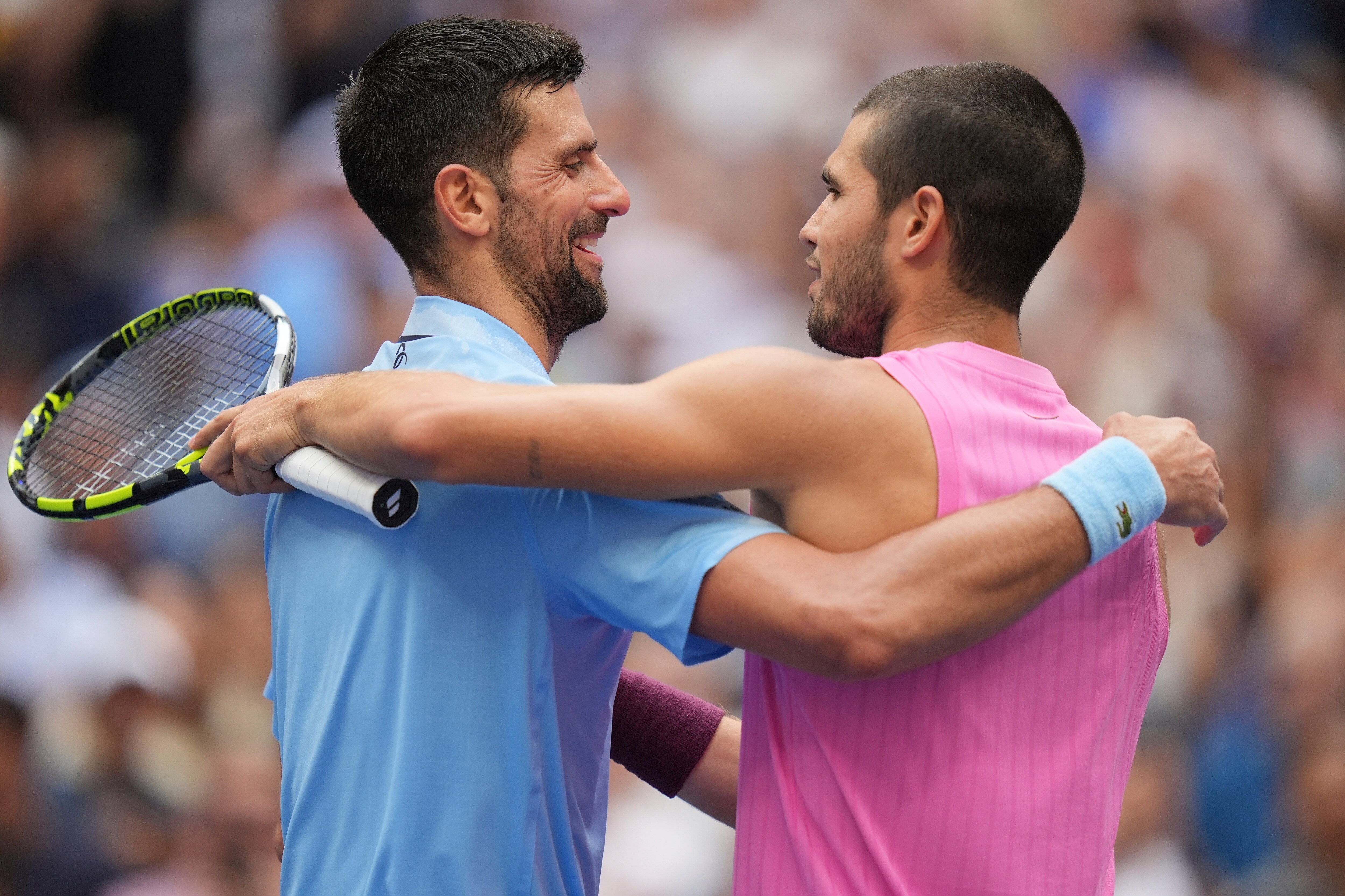 Novak Djokovic, of Serbia, congratulates Carlos Alcaraz, of Spain, after their the men's singles semifinals of the U.S. Open tennis championships, Friday, Sept. 5, 2025, in New York. (AP/PTI)(AP09_06_2025_000001B) (AP) Novak Djokovic, of Serbia, congratulates Carlos Alcaraz, of Spain, after their the men's singles semifinals of the U.S. Open tennis championships, Friday, Sept. 5, 2025, in New York. (AP/PTI)(AP09_06_2025_000001B) (AP)