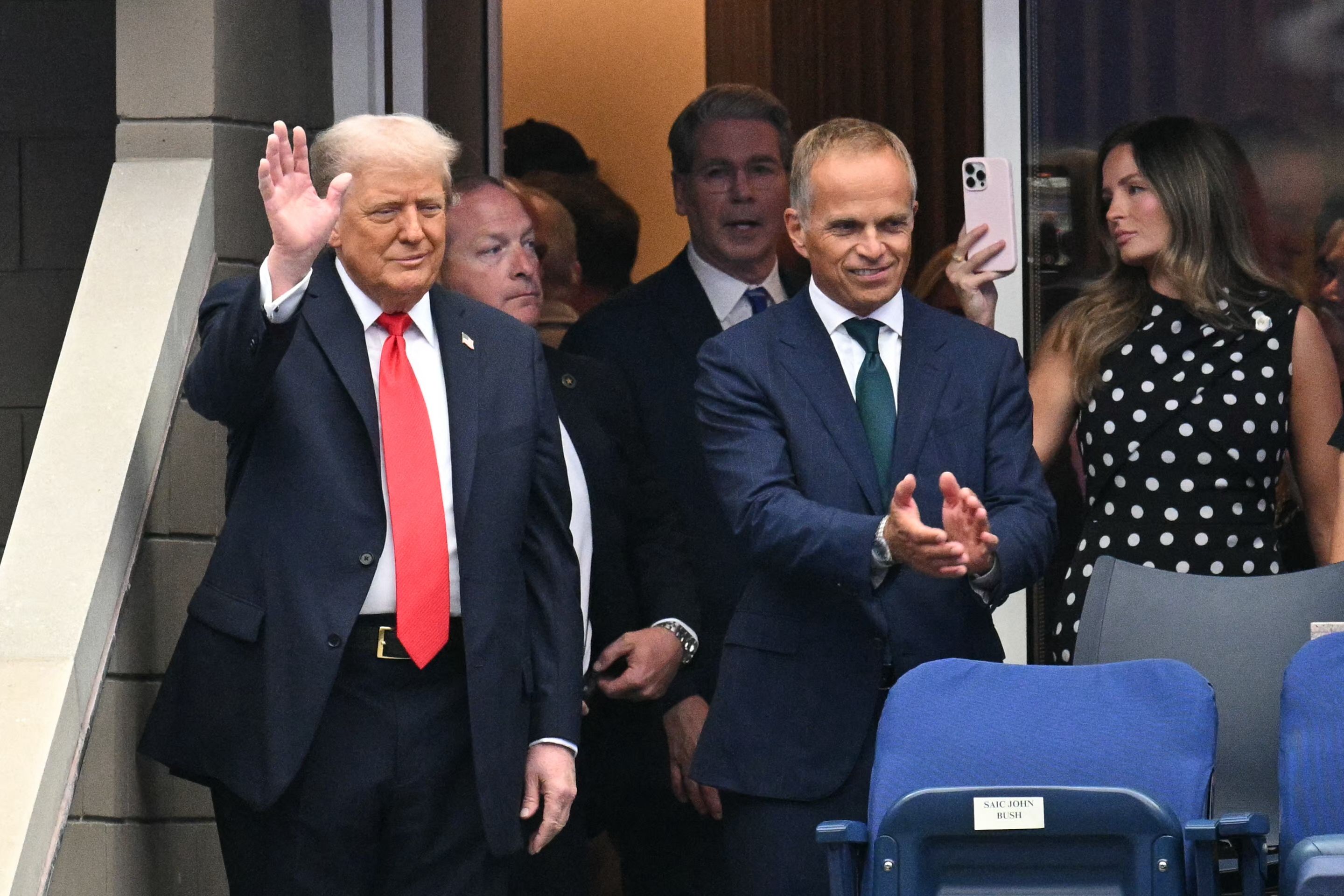 US President Donald Trump (L) waves as he arrives to attend the men's singles final tennis match between Spain's Carlos Alcaraz and Italy's Jannik Sinner on the last day of the US Open tennis tournament at the USTA Billie Jean King National Tennis Center (AFP) US President Donald Trump (L) waves as he arrives to attend the men's singles final tennis match between Spain's Carlos Alcaraz and Italy's Jannik Sinner on the last day of the US Open tennis tournament at the USTA Billie Jean King National Tennis Center (AFP)