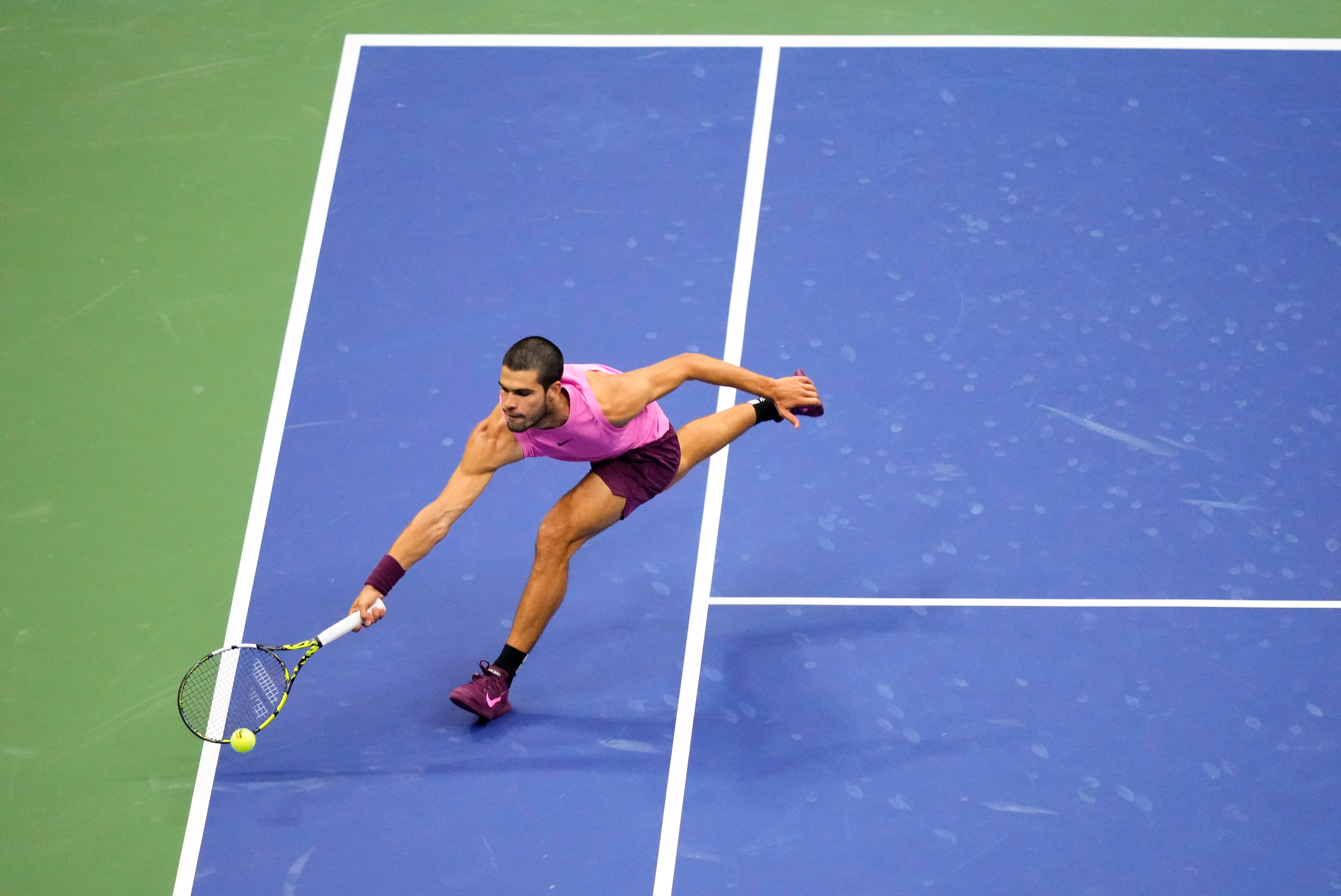 Carlos Alcaraz, of Spain, chases down a shot from Jannik Sinner, of Italy, during the men's singles final of the U.S. Open tennis championships, Sunday, Sept. 7, 2025, in New York. (AP Photo/Yuki Iwamura) (AP) Carlos Alcaraz, of Spain, chases down a shot from Jannik Sinner, of Italy, during the men's singles final of the U.S. Open tennis championships, Sunday, Sept. 7, 2025, in New York. (AP Photo/Yuki Iwamura) (AP)