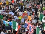 Protestors march from City Hall to the Federal Building on June 14, 2025 in Los Angeles, California following the the "No Kings" national demonstration. 