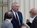France's Prime Minister Francois Bayrou speaks with French politician of the Democratic Movement (MoDem) Bruno Millienne (R) as he leaves the National Assembly after the result of a confidence vote over the government's austerity budget, at the National Assembly in Paris on September 8, 2025. France's Prime Minister Francois Bayrou speaks with French politician of the Democratic Movement (MoDem) Bruno Millienne (R) as he leaves the National Assembly after the result of a confidence vote over the government's austerity budget, at the National Assembly in Paris on September 8, 2025.