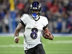 Baltimore Ravens quarterback Lamar Jackson (8) runs with the ball against the Buffalo Bills 
