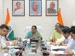 Delhi chief minister Rekha Gupta, with husband Manish Gupta seated on her left, during an official meeting. Delhi chief minister Rekha Gupta, with husband Manish Gupta seated on her left, during an official meeting.