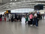 Passengers stand inside T5 at Heathrow airport after an air traffic control (ATC) fault caused major disruption on Wednesday, July 30, 2025. Passengers stand inside T5 at Heathrow airport after an air traffic control (ATC) fault caused major disruption on Wednesday, July 30, 2025.