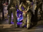 Representative file image: Police officers detain a demonstrator during a protest