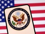 United States Department of State logo and US flag are seen in this illustration 