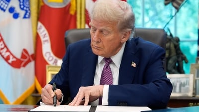 Experts reveal what Trump's signature says about his personality. (AP) Experts reveal what Trump's signature says about his personality. (AP)