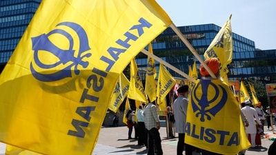 Members of the Sikh community hold flags as they protest Prime Minister Narendra Modi in front of Calgary City Hall on June 16, 2025 in Calgary, Alberta. (File Getty Images via AFP)