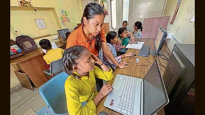Children from slum areas attending a computer class being organised by an NGO in Ludhiana. (Gurpreet Singh/HT) Children from slum areas attending a computer class being organised by an NGO in Ludhiana. (Gurpreet Singh/HT)