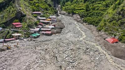 Debris at an affected area following flash floods at Dharali, in Uttarkashi in August. (PTI) Debris at an affected area following flash floods at Dharali, in Uttarkashi in August. (PTI)