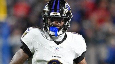 Baltimore Ravens quarterback Lamar Jackson runs with the ball against the Buffalo Bills. (IMAGN IMAGES via Reuters Connect)