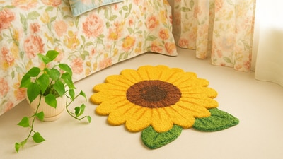 A bright sunflower mat and pastel floral touches instantly uplift a room, blending colour, scent and texture beautifully. A bright sunflower mat and pastel floral touches instantly uplift a room, blending colour, scent and texture beautifully.