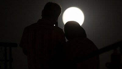 People gather to watch the "Blood Moon" total lunar eclipse in Tehran, Iran, September 7, 2025.&nbsp; (via REUTERS)