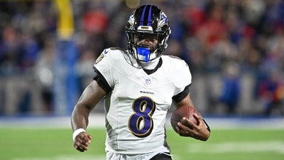 Baltimore Ravens quarterback Lamar Jackson (8) runs with the ball against the Buffalo Bills (IMAGN IMAGES via Reuters Connect)