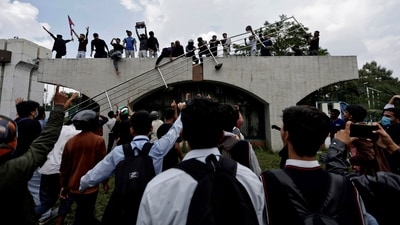 The entrance of the Parliament building in Kathmandu was seen surrounded by demonstrators in protest against the government's ban on social media platforms (Reuters)