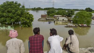 People stare at a flooded area following incessant rainfall in Jalandhar, Punjab. (PTI) People stare at a flooded area following incessant rainfall in Jalandhar, Punjab. (PTI)