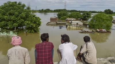 Punjab is facing its worst floods in four decades, triggered by the swollen Sutlej, Beas and Ravi rivers and heavy rainfall that has affected nearly four lakh people in 2,000 villages. (PTI) Punjab is facing its worst floods in four decades, triggered by the swollen Sutlej, Beas and Ravi rivers and heavy rainfall that has affected nearly four lakh people in 2,000 villages. (PTI)