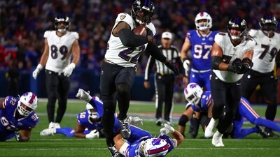 Derrick Henry runs for a touchdown against the Buffalo Bills as Cole Bishop lies on the ground. (AP) Derrick Henry runs for a touchdown against the Buffalo Bills as Cole Bishop lies on the ground. (AP)