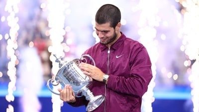 Carlos Alcaraz celebrates with the US Open men's singles trophy after beating Jannik Sinner in New York. (AFP) Carlos Alcaraz celebrates with the US Open men's singles trophy after beating Jannik Sinner in New York. (AFP)