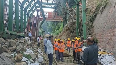 The railway personnel involved in clearing landslide debris on Haridwar-Dehradun railway track at Bhimgoda in Haridwar on Monday. (HT PHOTO) The railway personnel involved in clearing landslide debris on Haridwar-Dehradun railway track at Bhimgoda in Haridwar on Monday. (HT PHOTO)